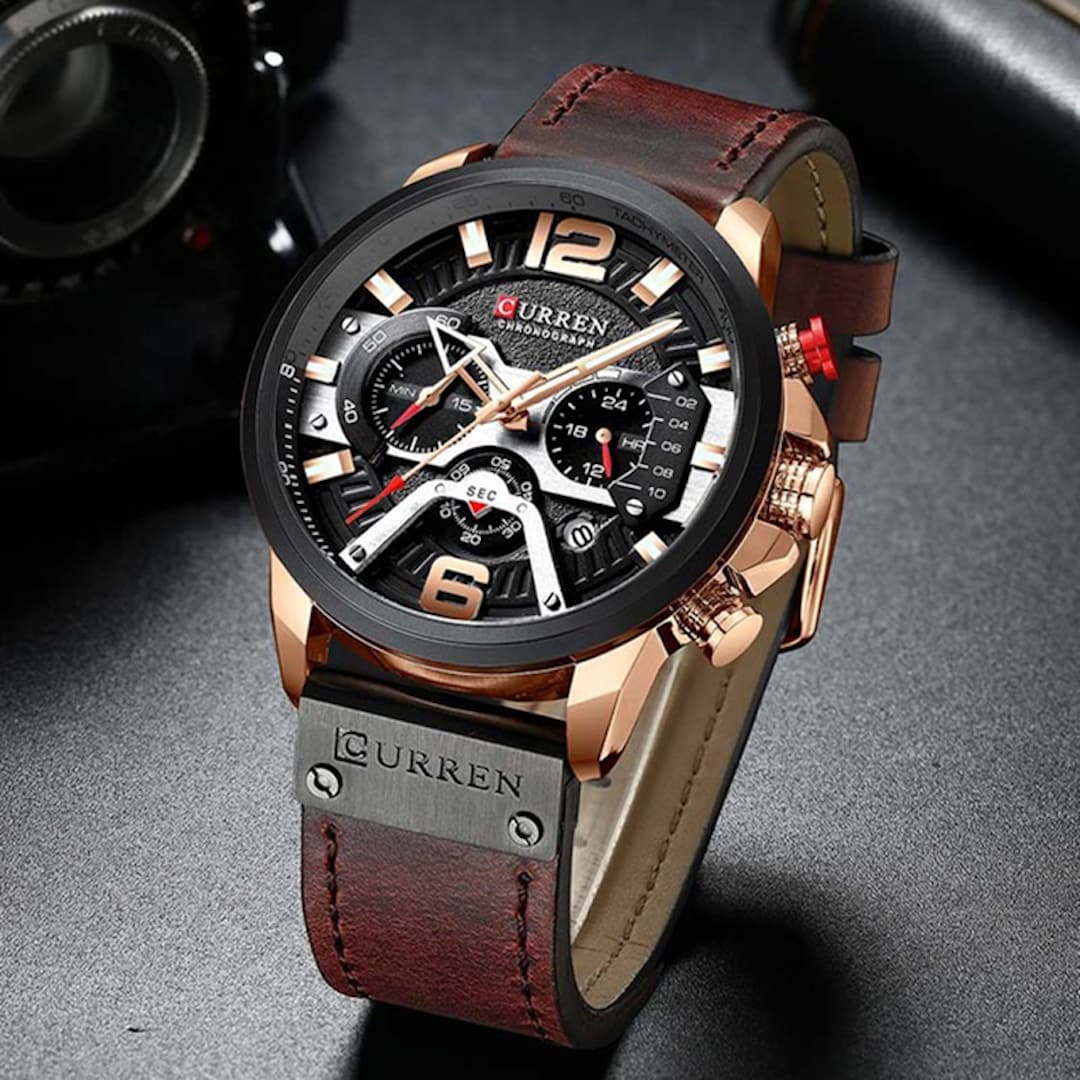 Orologio uomo Curren New Age BG, vista frontale, evidenzia i dettagli del quadrante e gli elementi funzionali, come il cronometro e le lancette luminescenti.