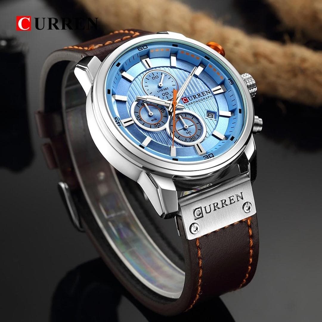 Orologio uomo Curren Chronograph Silver/Blue con quadrante blu e cinturino in pelle marrone.